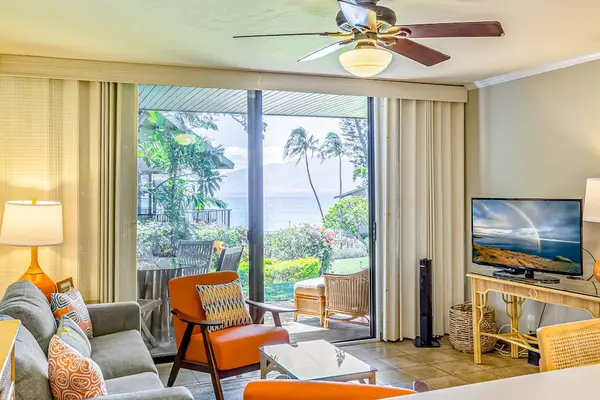 Open Concept Lounge With Tropical Charm