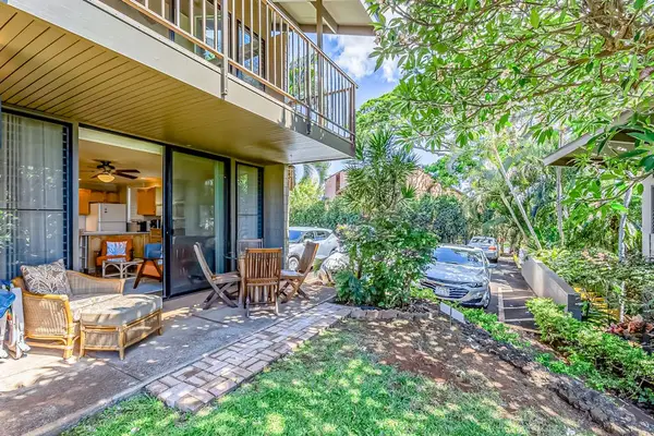 Garden Side Patio Surrounded By Island Greenery
