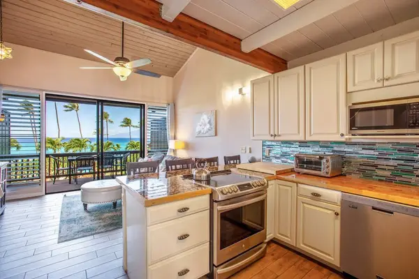 Newly remodeled kitchen with stainless steel appliances.