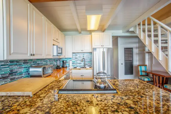 Newly remodeled kitchen with stainless steel appliances.
