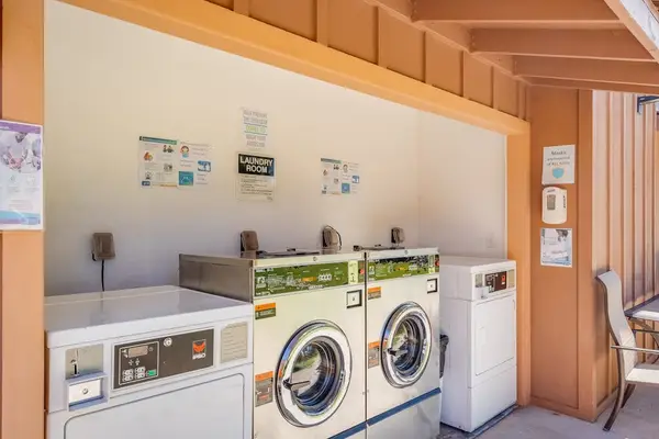Shared washer and dryer area adds convenience throughout your comfortable extended stay