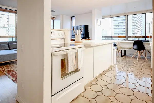 Prepare your favorite meals with ease in a fully equipped kitchen designed for a comfortable stay.
