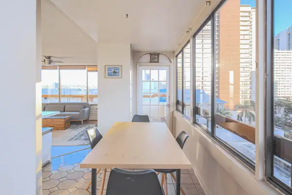 Enjoy the comfort of a connected living space featuring a dining area, cozy lounge, and functional kitchen.
