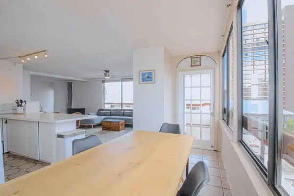 A welcoming open-concept space where dining, relaxing, and cooking come together seamlessly.