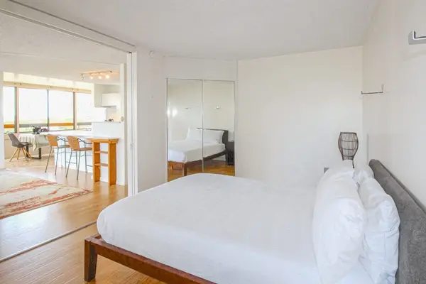 Relax and recharge in a comfortable bedroom featuring a queen-size bed for a restful stay.