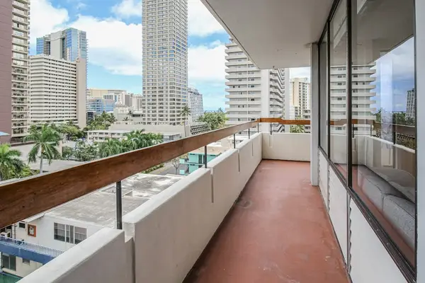 Unwind outdoors while overlooking the beautiful city skyline from the balcony.