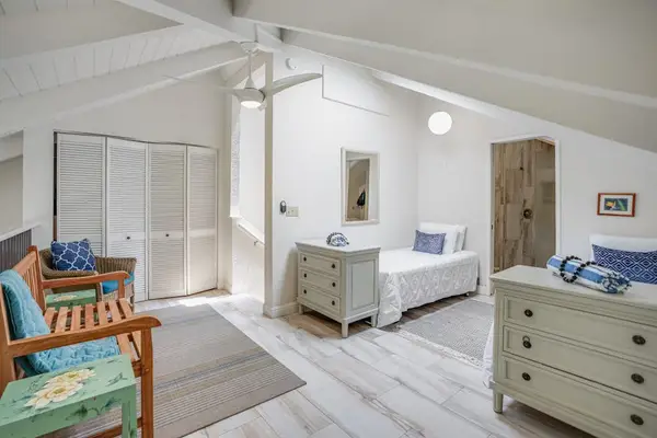 Relax in the inviting loft with comfortable twin beds.