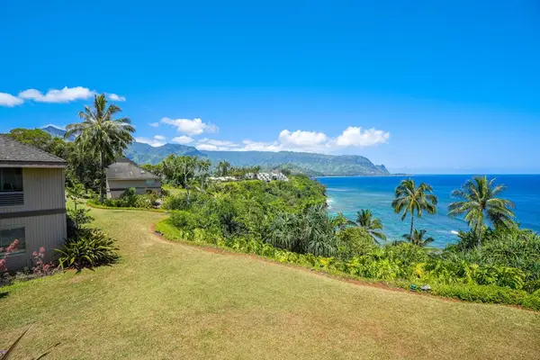 Enjoy peaceful ocean views from the spacious green lawn.