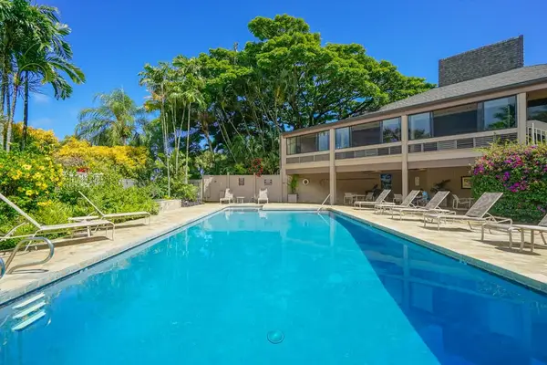 Enjoy the resort pool in a peaceful tropical setting.