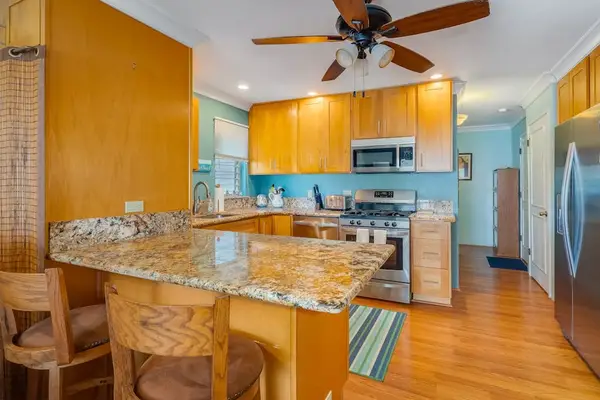 Stylish kitchen with adjoining dining area creates the perfect setting for shared breakfasts