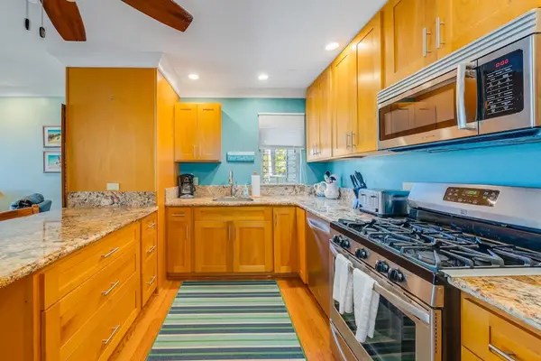 Functional kitchen offers generous workspace for cooking meals and gathering with loved ones