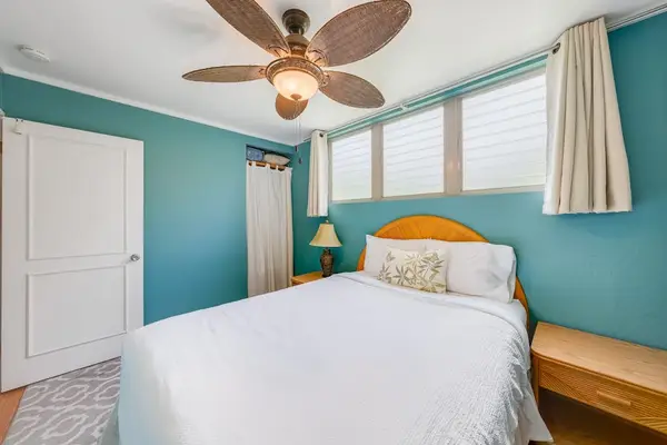 Relax in this inviting bedroom with a warm atmosphere and cozy sleeping space
