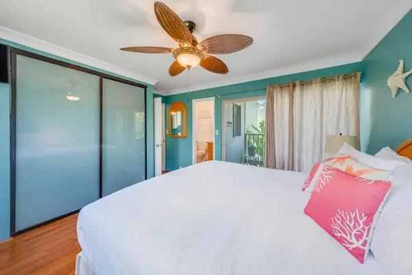 Bright and airy bedroom creates a comfortable retreat for relaxing throughout your vacation