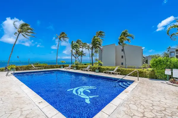 Unwind beside the resort pool with peaceful surroundings and beautiful island-inspired landscapes nearby