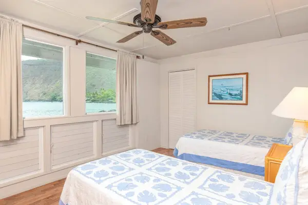 Twin Bedroom with a Peaceful Water View