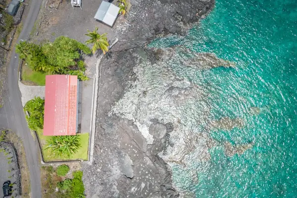 Drone View Showcasing the Oceanfront Location