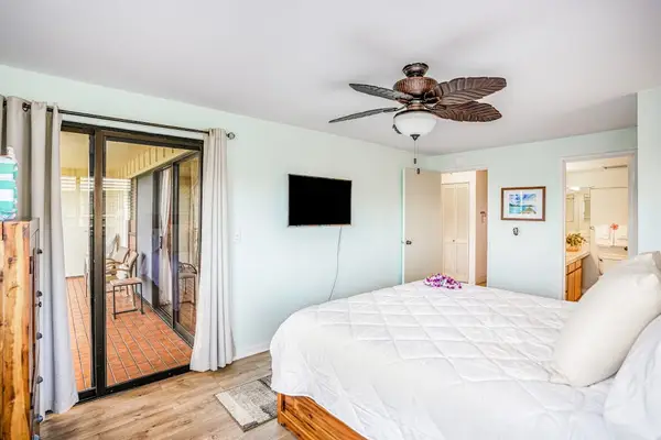 Spacious Bedroom With Balcony Access