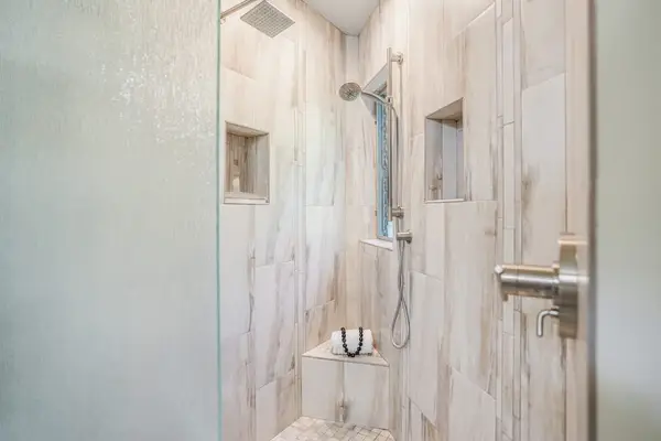 Refresh In A Luxurious Walk-In Rain Shower