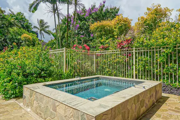 Outdoor hot tub offers soothing warmth beneath skies and stars