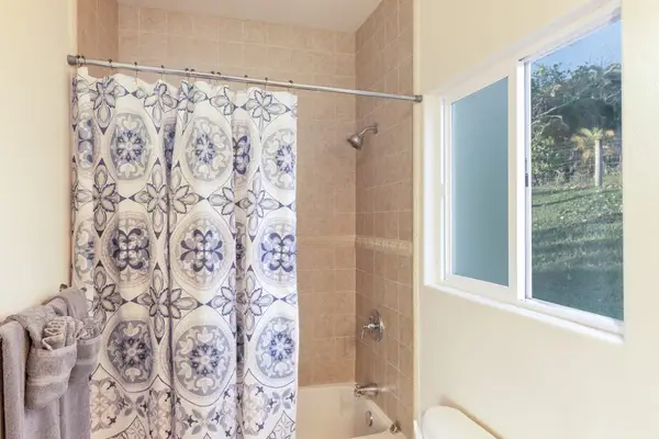 Bright Bathroom With Shower And Tub