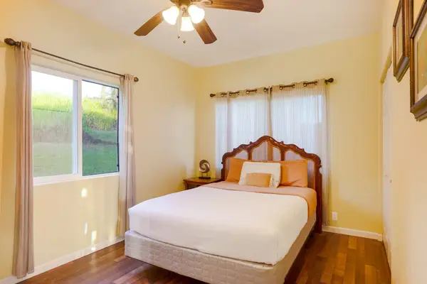 Peaceful Primary Bedroom With Garden Views