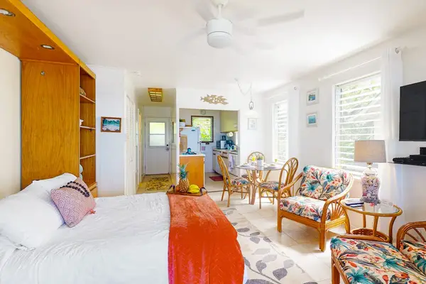 Bright studio with comfortable living and dining areas.