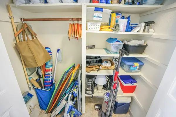 Organized Storage Closet With Beach Essentials
