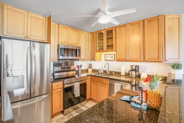 Fully Equipped Kitchen With Wood Cabinetry