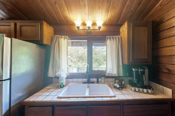 While there are excellent dining options within a short drive, the full kitchen offers the opportunity to cook an al fresco meal to enjoy together on the custom dining table or backyard lanai.