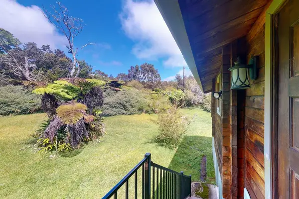 Tranquil home on 1.82-acres with a lanai.