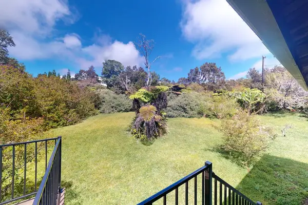 Tranquil home on 1.82-acres with a lanai.