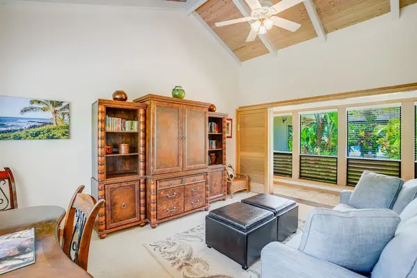 Sunlit Primary Bedroom With Vaulted Ceilings