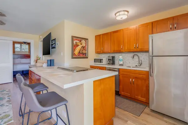 Kitchen island with bar seating, perfect for casual dining or morning coffee.