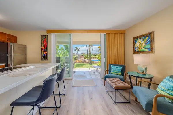 Open dining area with sliding doors that let in fresh island breezes.