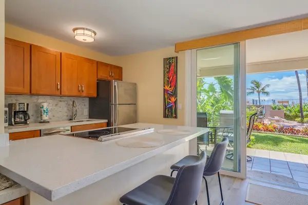 Modern kitchen featuring full-size appliances and ample counter space.