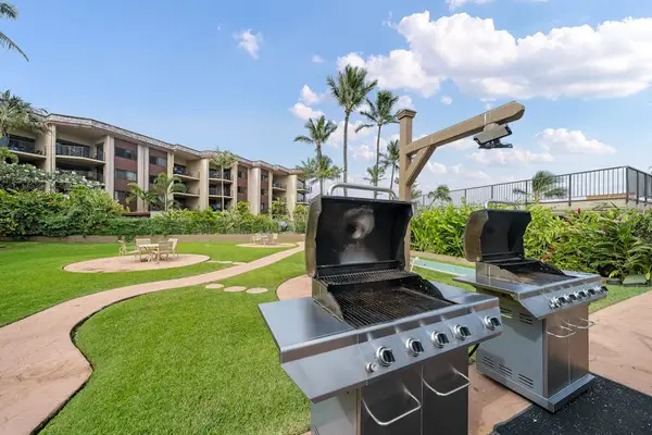 Community BBQ area, perfect for outdoor grilling with family and friends.