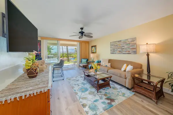 Cozy living room with comfortable seating for relaxing after a day of exploring.