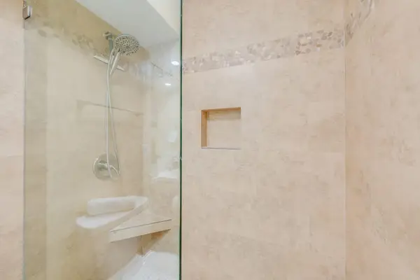 Beautiful walk-in shower with modern finishes.