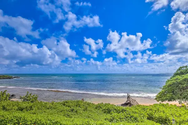 Admire the endless blue horizon from this spectacular beachfront location.