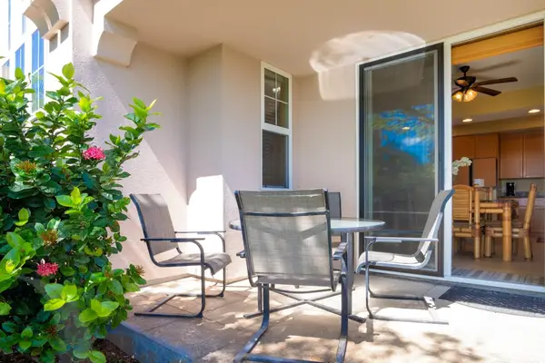 Relax on the private lanai surrounded by tropical greenery