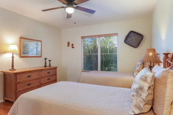 Cozy guest bedroom with natural light