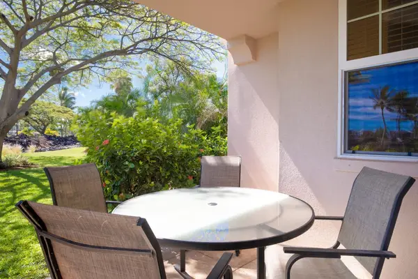 Relax on the private lanai surrounded by tropical greenery