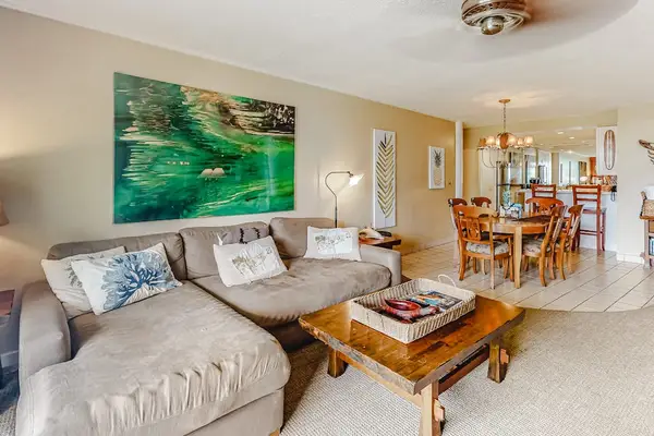 Large sectional sofa paired with a rustic wooden coffee table
