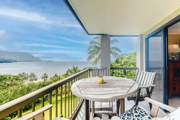 Private balcony with wooden dinning table