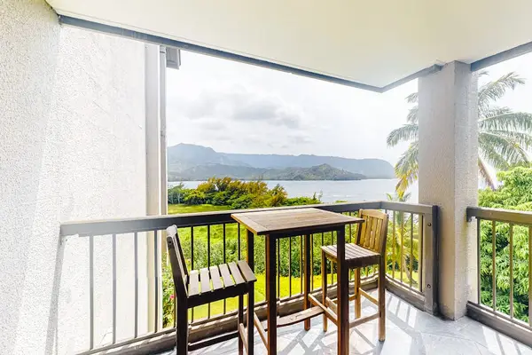 Small table with a set of chairs to relax while taking in the beautiful view