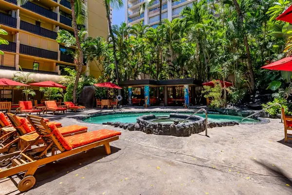 Spend leisurely moments enjoying the pool’s peaceful outdoor setting.