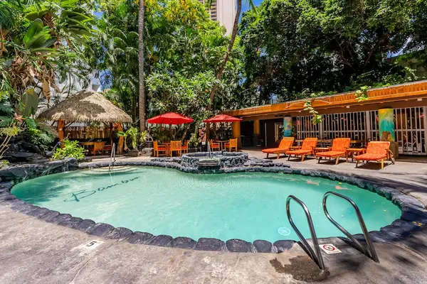 Take a dip or unwind beside the welcoming resort pool.