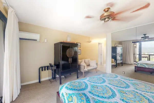 Recharge comfortably in this peaceful bedroom after sunny island adventures