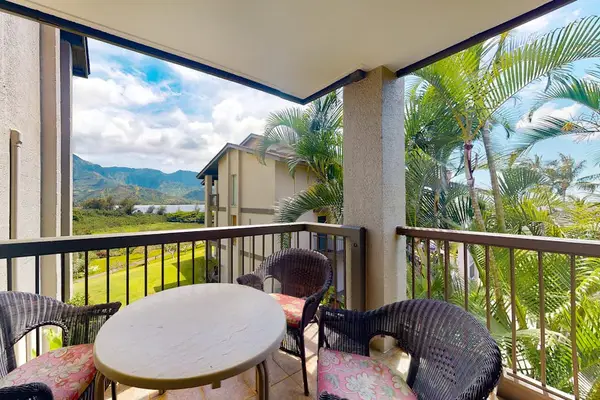 Enjoy outdoor dining and refreshing breezes from this covered balcony