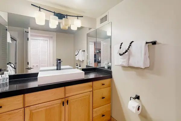 Bright bathroom vanity offers plenty of space for daily routines